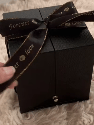 Caja de joyería de rosa eterna